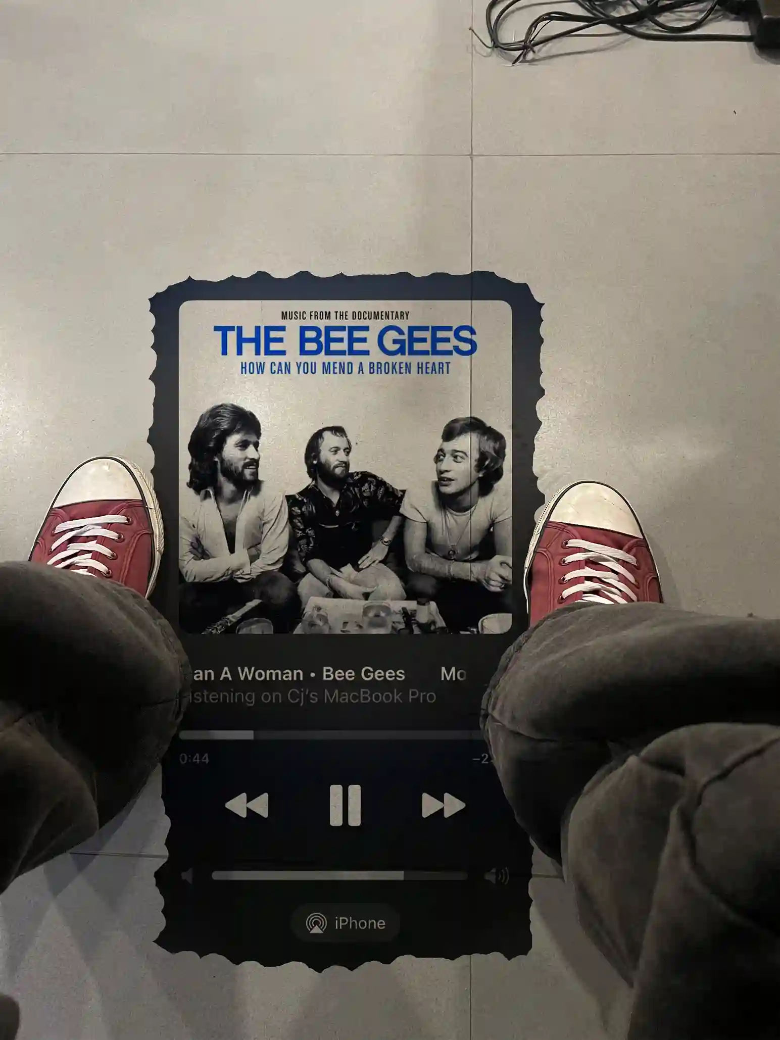 Artistic poster showing media elements under feet